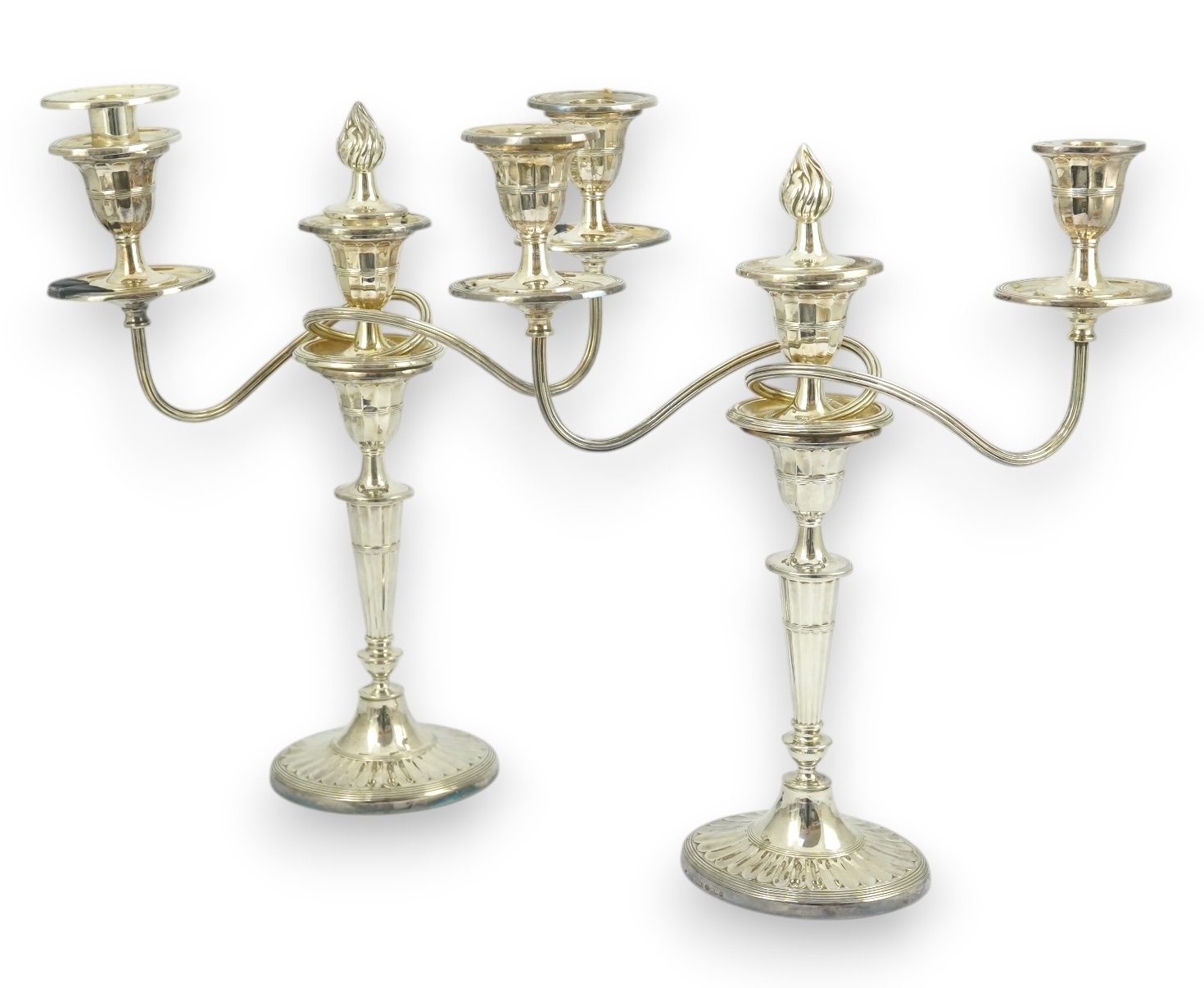 A modern pair of silver two branch three light oval candelabra, by James Dixon and Sons Ltd